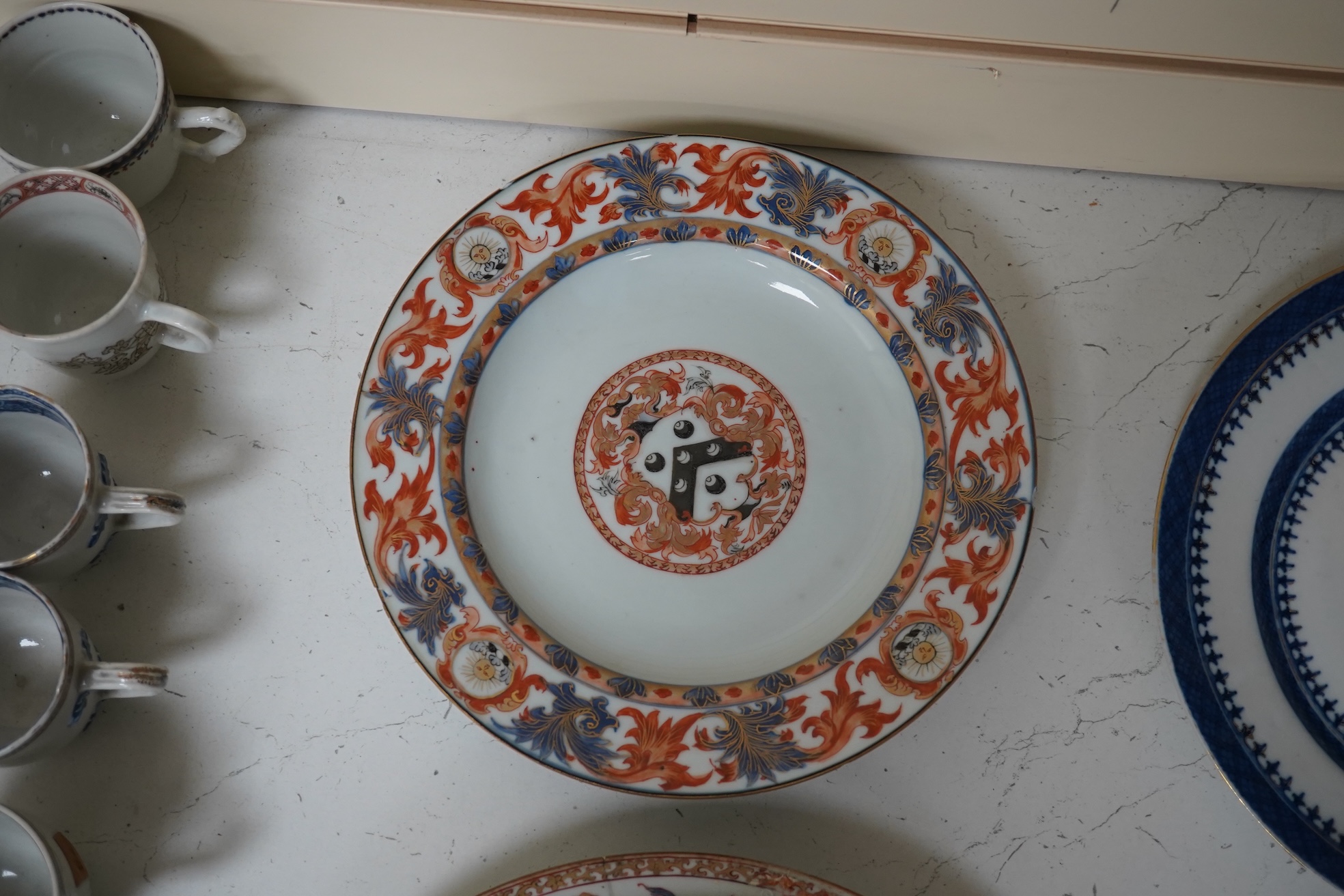 Seven assorted 18th century Chinese armorial plates. Condition - mostly restored